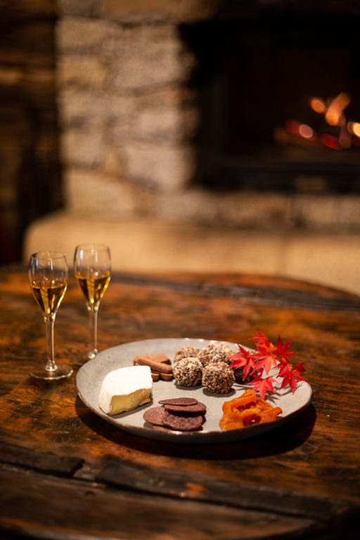 Drinks and treats in front of the open fire